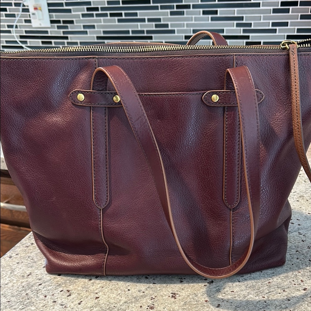 Fossil Gold and Red Leather Tote Bag with Minimalist Design